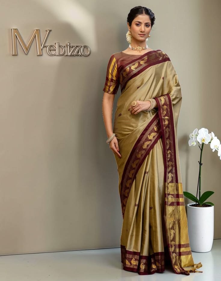 khaki silk woven kanjivaram saree with maroon border, gold zari pallu and blouse piece